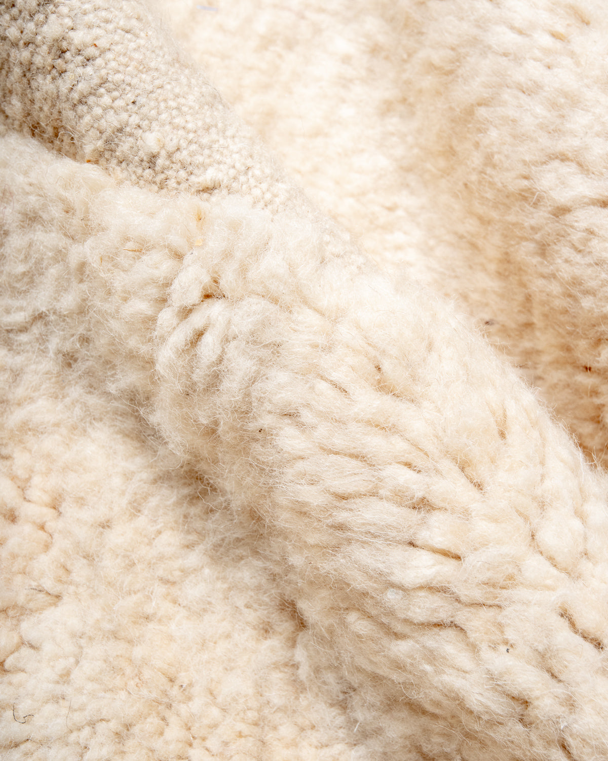 Modern, designer, handcrafted Berber rug from Morocco. Beniourain carpet with beautiful colours and patterns and fluffy wool texture.